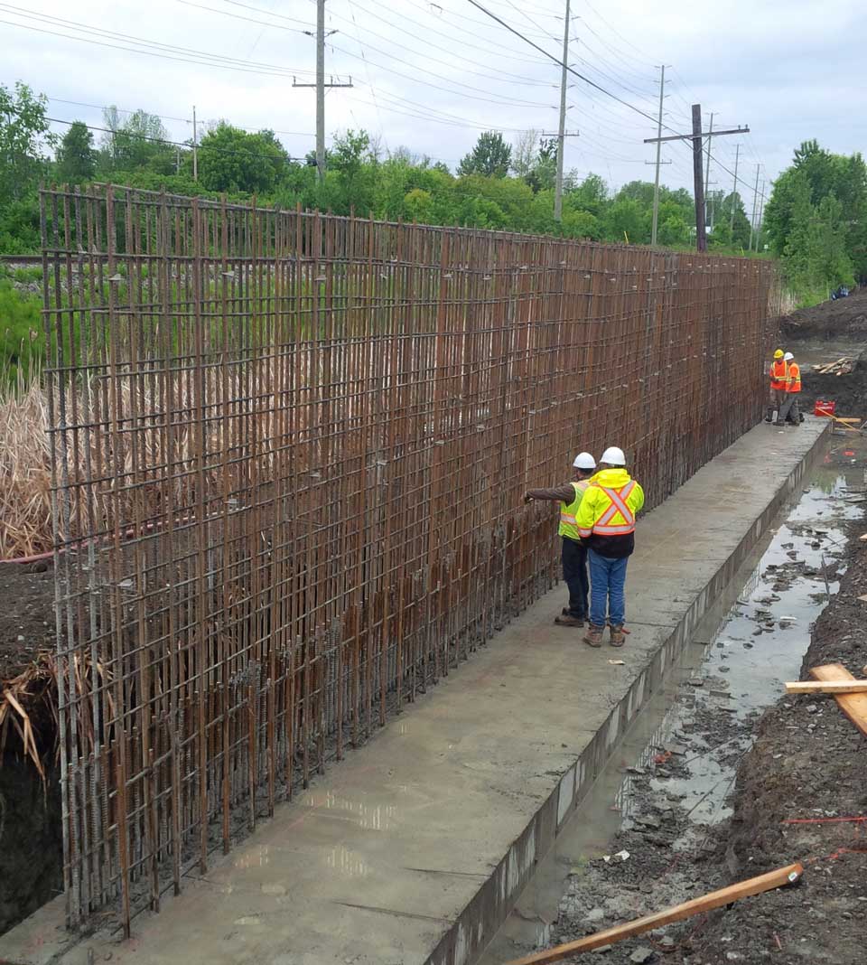 marchroadsitedevelopment7rebarinspectioncrashwall R.K. Porter