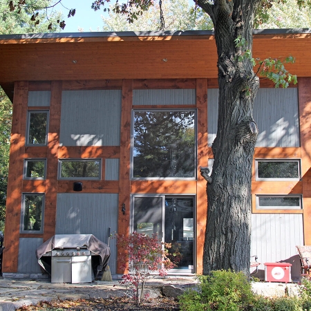 Residential project - grey and orange cottage - rear view, two storey