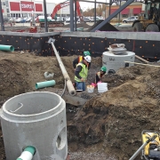 Commercial project - 2140 Carling Rd. - storm water service pump tank, foundation water proofing, trenching, excavation, site service, building service connection