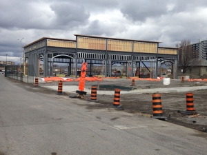 Commercial project 2140 Carling Rd. - site work, steel framing, parking lot, concrete sidewalk, building frame, no sheathing