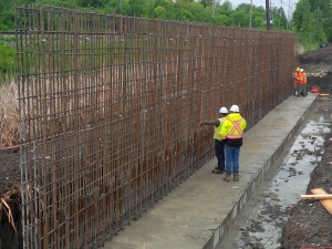 Commercial project - March Rd. - rebar inspection, footing cast in place, concrete crashwall, rebar for wall
