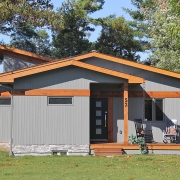 Residential project - grey and orange cottage - entrance