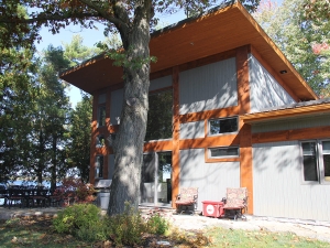 Residential project - grey and orange cottage - rear view